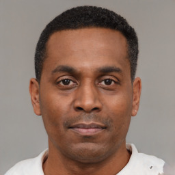Neutral black young-adult male with short  black hair and brown eyes
