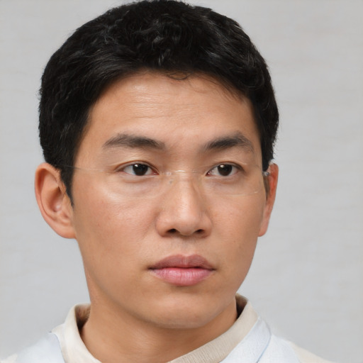 Neutral asian young-adult male with short  brown hair and brown eyes