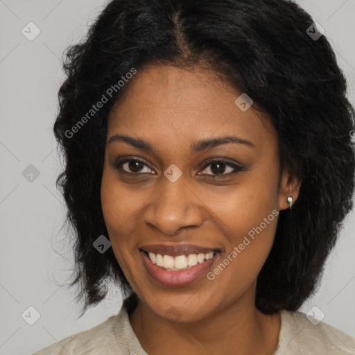 Joyful black young-adult female with medium  brown hair and brown eyes