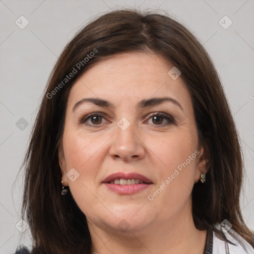 Joyful white adult female with medium  brown hair and brown eyes