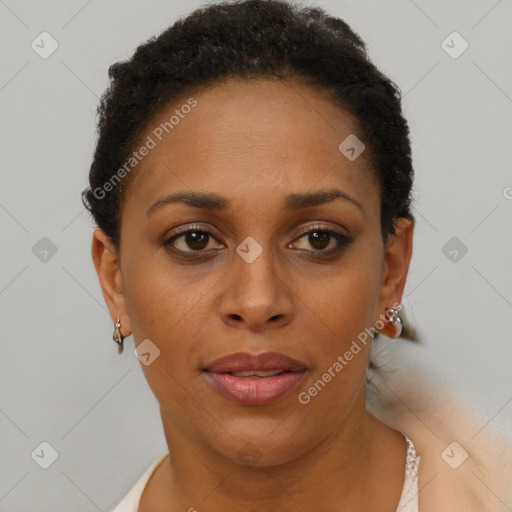 Joyful black adult female with short  brown hair and brown eyes