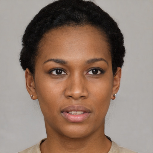 Neutral black young-adult female with short  black hair and brown eyes