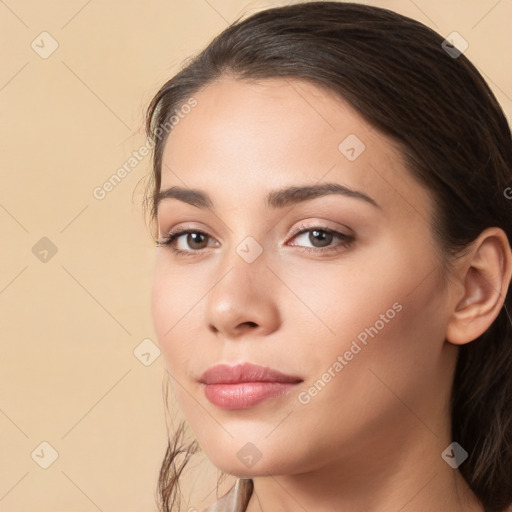 Neutral white young-adult female with long  brown hair and brown eyes