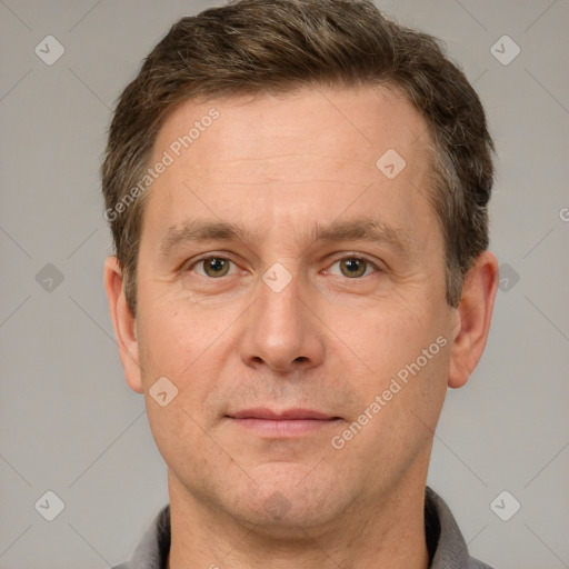 Neutral white adult male with short  brown hair and grey eyes