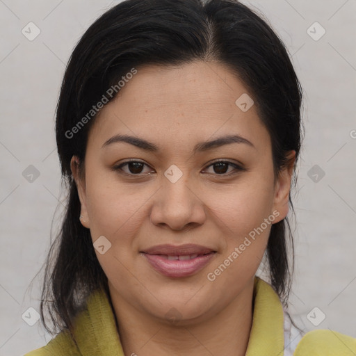 Joyful latino young-adult female with medium  brown hair and brown eyes