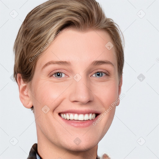 Joyful white young-adult female with short  brown hair and blue eyes