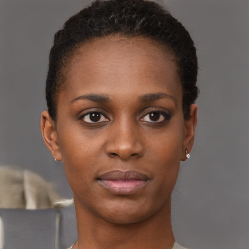 Neutral black young-adult female with short  brown hair and brown eyes