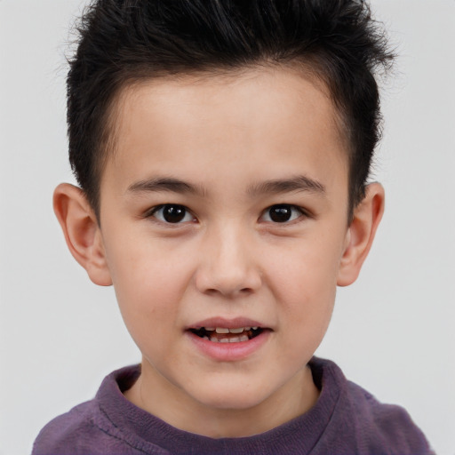 Joyful white child male with short  brown hair and brown eyes