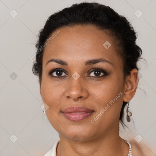 Joyful latino young-adult female with short  brown hair and brown eyes