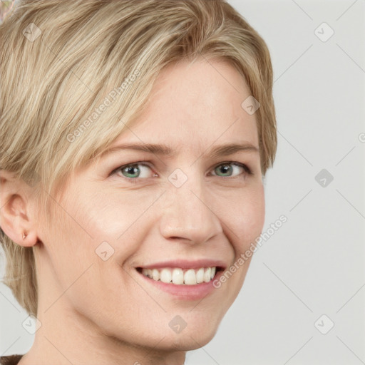 Joyful white young-adult female with medium  brown hair and blue eyes