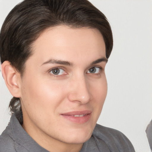 Joyful white young-adult male with medium  brown hair and brown eyes