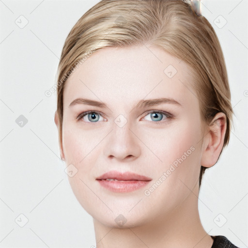 Joyful white young-adult female with long  brown hair and blue eyes