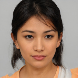 Neutral asian young-adult female with medium  brown hair and brown eyes