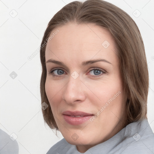 Neutral white young-adult female with medium  brown hair and grey eyes