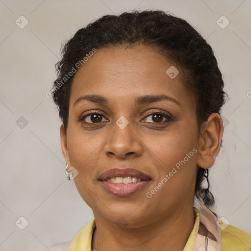 Joyful latino young-adult female with short  brown hair and brown eyes