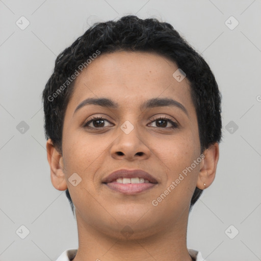 Joyful latino young-adult female with short  brown hair and brown eyes