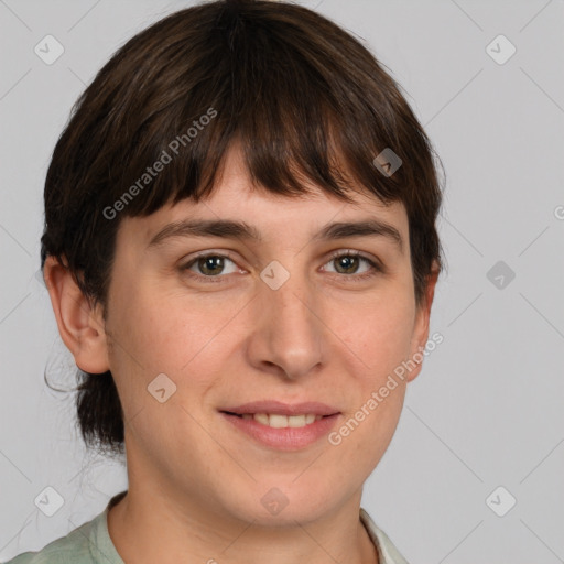 Joyful white young-adult female with short  brown hair and grey eyes