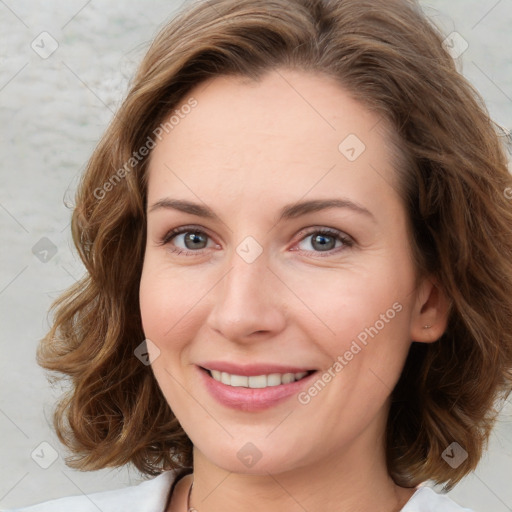 Joyful white young-adult female with medium  brown hair and green eyes