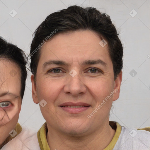 Joyful white adult female with short  brown hair and brown eyes