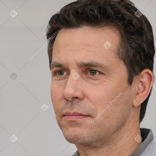 Neutral white adult male with short  brown hair and brown eyes