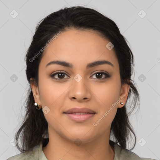 Joyful latino young-adult female with medium  brown hair and brown eyes