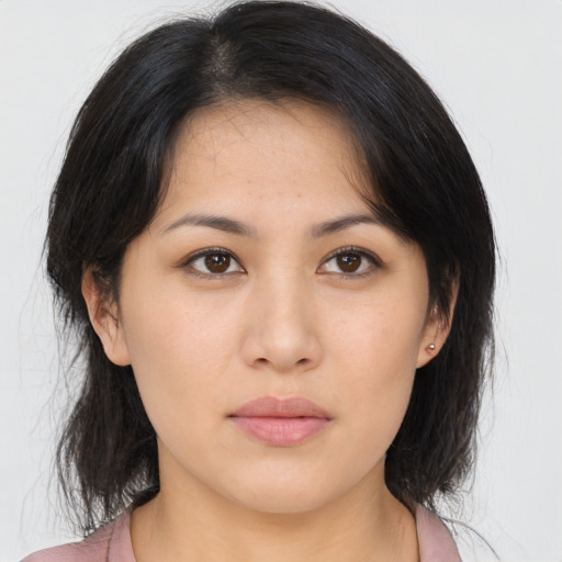 Neutral asian young-adult female with medium  brown hair and brown eyes