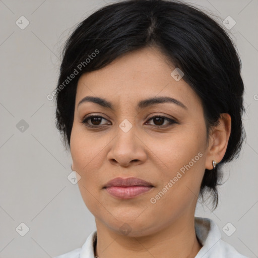 Joyful latino young-adult female with medium  black hair and brown eyes