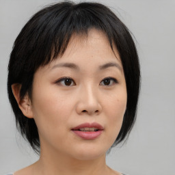 Neutral asian young-adult female with medium  brown hair and brown eyes