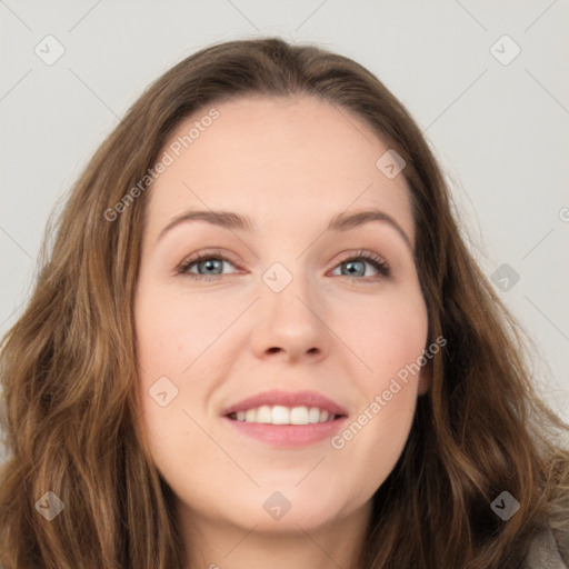 Joyful white young-adult female with long  brown hair and green eyes