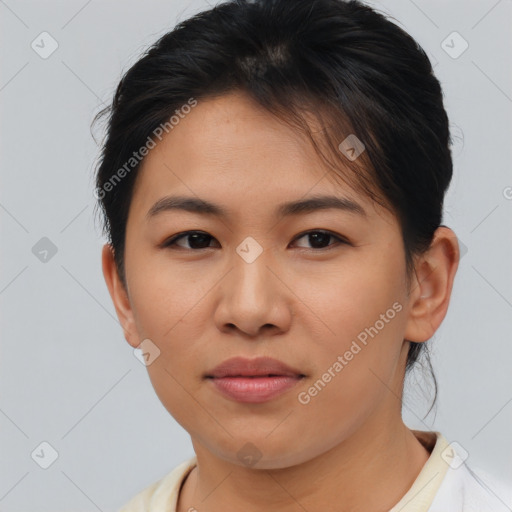 Joyful asian young-adult female with short  brown hair and brown eyes