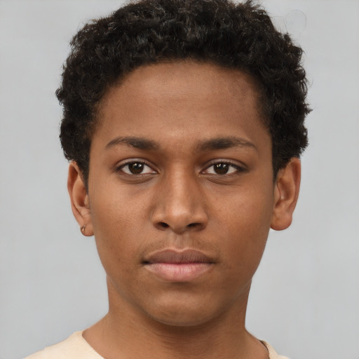 Neutral black young-adult male with short  brown hair and brown eyes