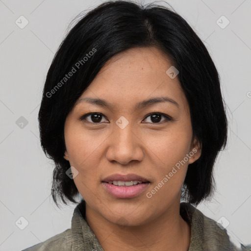 Joyful asian young-adult female with medium  black hair and brown eyes