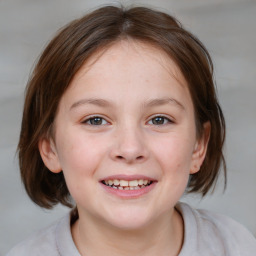 Joyful white child female with medium  brown hair and blue eyes