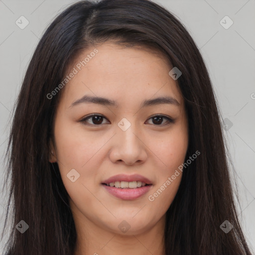 Joyful asian young-adult female with long  brown hair and brown eyes