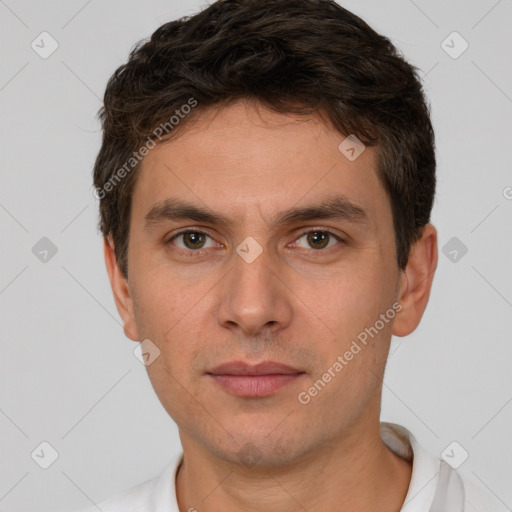 Neutral white young-adult male with short  brown hair and brown eyes