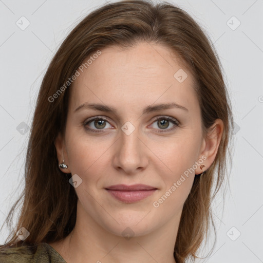 Joyful white young-adult female with long  brown hair and blue eyes