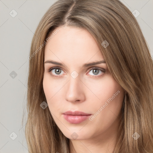 Neutral white young-adult female with long  brown hair and brown eyes