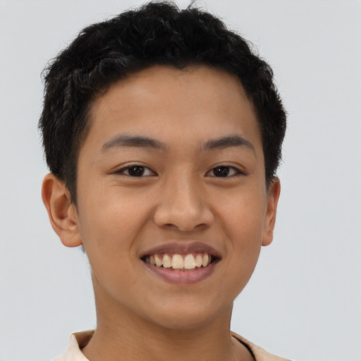 Joyful latino young-adult male with short  brown hair and brown eyes