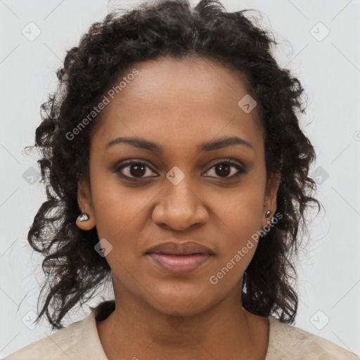 Joyful black young-adult female with long  brown hair and brown eyes