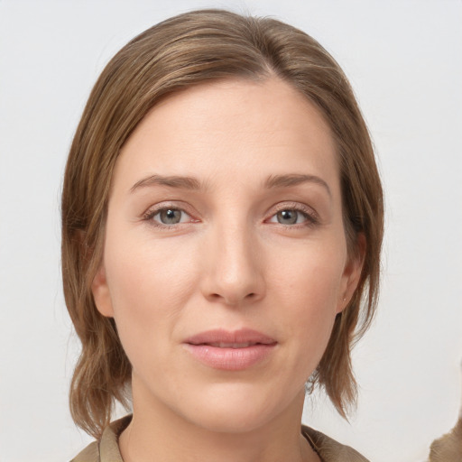 Neutral white young-adult female with medium  brown hair and grey eyes