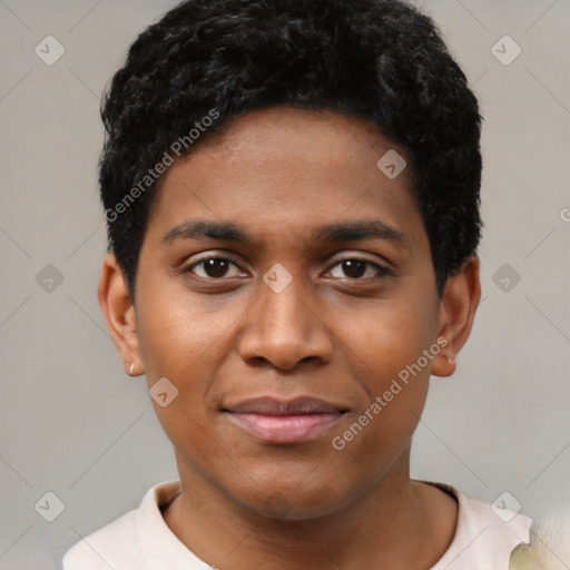 Joyful black young-adult male with short  black hair and brown eyes