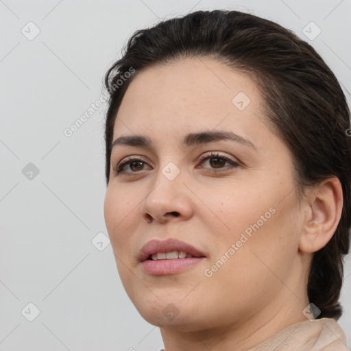 Joyful white young-adult female with medium  brown hair and brown eyes