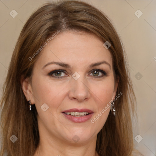 Joyful white adult female with long  brown hair and brown eyes