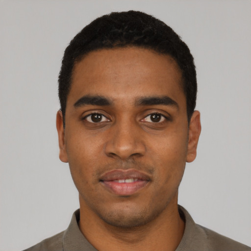 Neutral black young-adult male with short  black hair and brown eyes