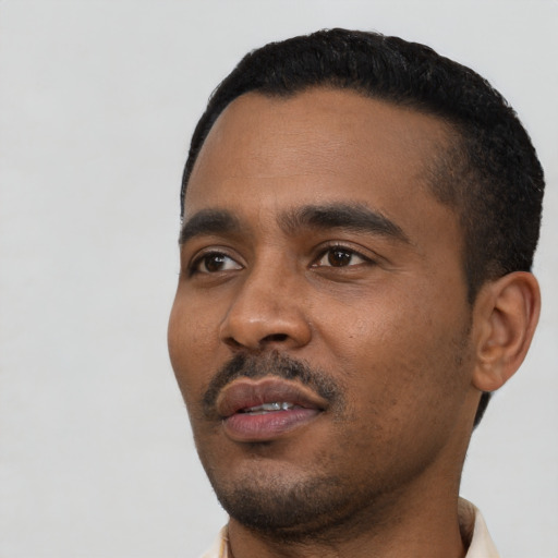 Neutral black young-adult male with short  black hair and brown eyes