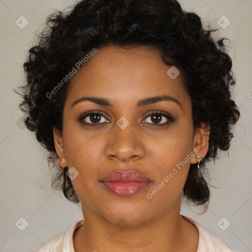 Joyful black young-adult female with medium  brown hair and brown eyes