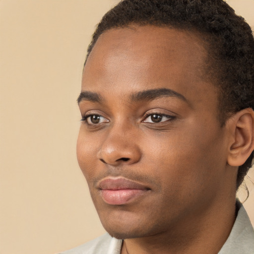 Neutral black young-adult male with short  black hair and brown eyes