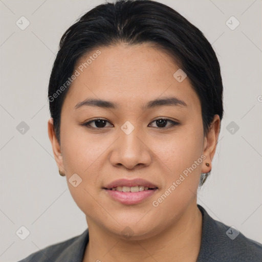 Joyful asian young-adult female with short  black hair and brown eyes