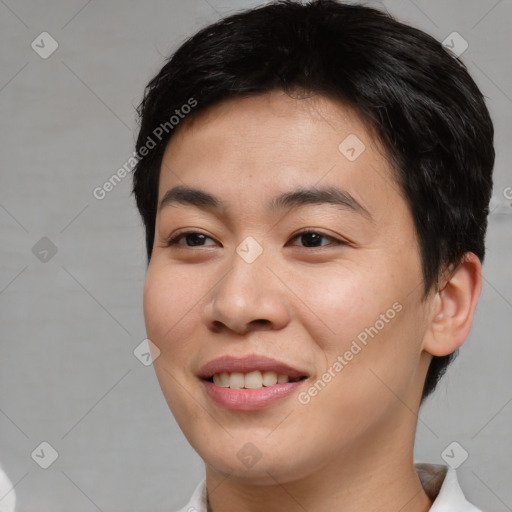 Joyful asian young-adult male with short  brown hair and brown eyes