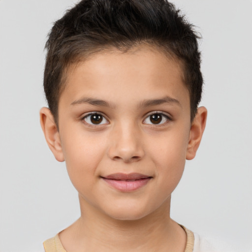 Joyful white child female with short  brown hair and brown eyes